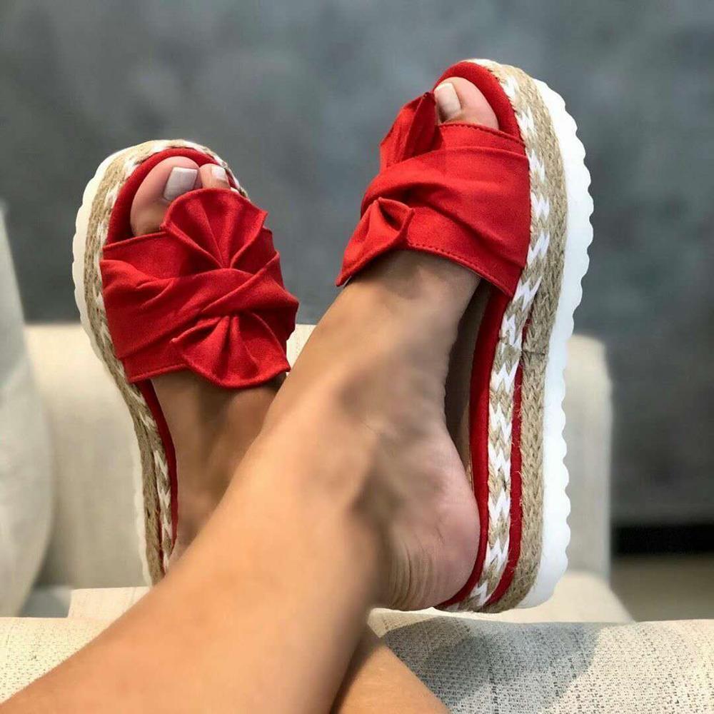 Qosella | Sandalen mit geflochtener Sohle und großer Schleife