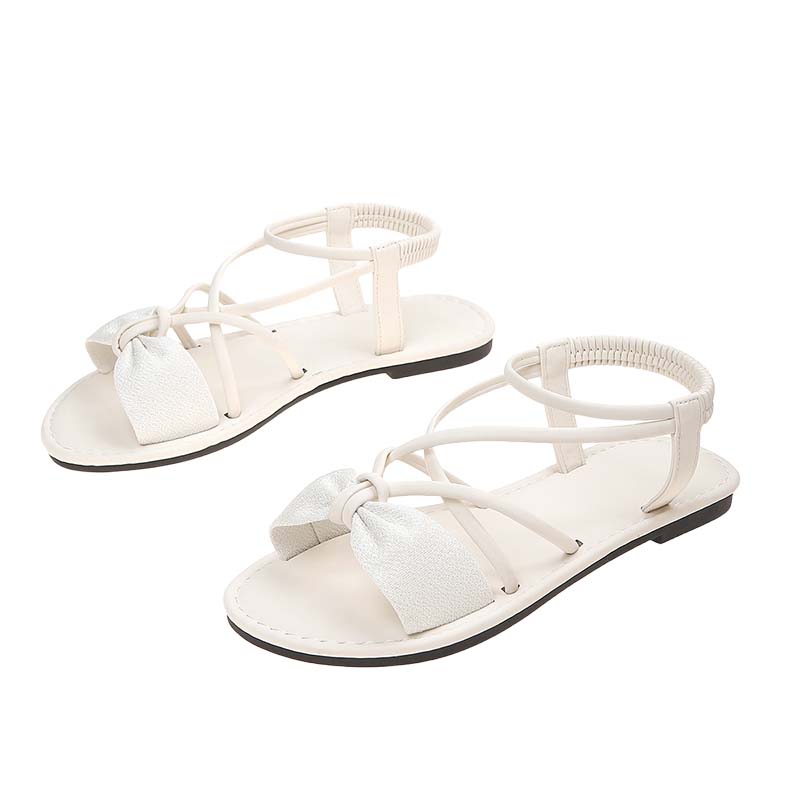 Hasmien | Flache Sandalen mit gekreuzten Riemchen