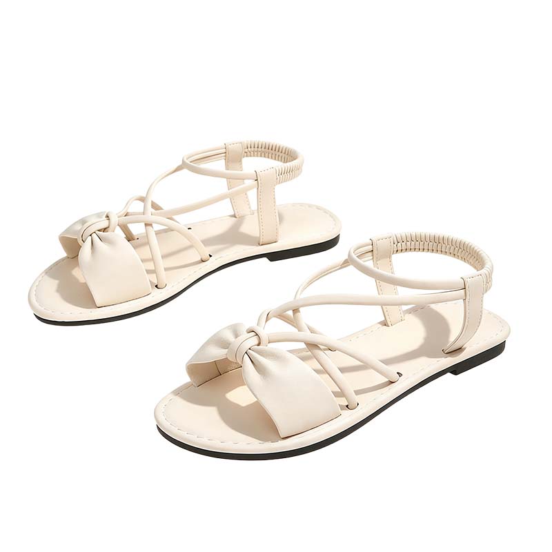 Hasmien | Flache Sandalen mit gekreuzten Riemchen